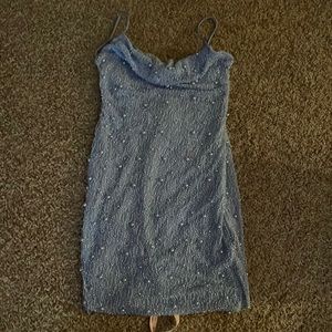 Brand new oh Polly dress, it’s a size 6 in us sizing.